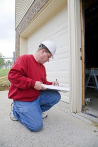 Man working on a garage door