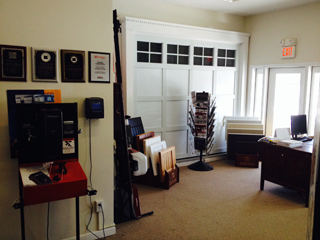 Showroom with Cambridge door and a wall showing Awards